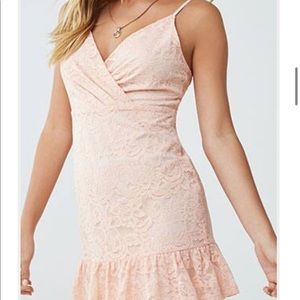 Pink lace cami dress with ruffled bottom